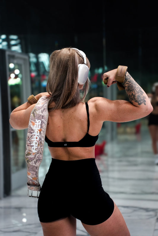 woman flexing bicep