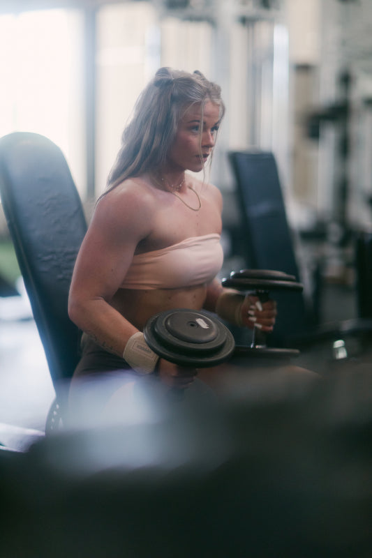 woman getting ready to do chest exercise